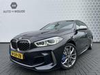BMW 1-serie M135i xDrive High Executive LED 306PK automaat, Autos, 5 places, Série 1, 159 g/km, Noir