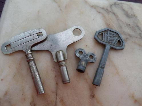 Antieke speelgoedsleutels met oprolbare sleutels (MF) en klo, Antiek en Kunst, Curiosa en Brocante, Ophalen of Verzenden
