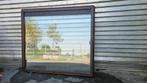 Groot vast raam met dubbel glas, Ophalen