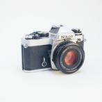 Nikon FE /w 50mm f1.8 E-series [35mm kit], Audio, Tv en Foto, Fotocamera's Analoog, Verzenden