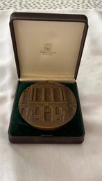 Medaille, Ophalen