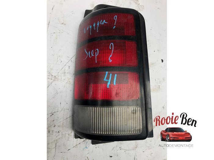 Achterlicht links van een Dodge Caravan, Auto-onderdelen, Verlichting, Dodge, Gebruikt, 3 maanden garantie, Ophalen of Verzenden
