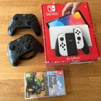 Nintendo Switch witte OLED + 2 controllers + 1 spel, Games en Spelcomputers, Spelcomputers | Nintendo Switch, Ophalen of Verzenden