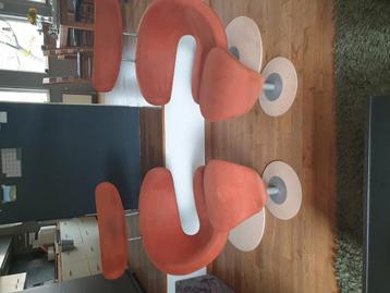 Te koop: 2x Stokke Peel fauteuils met hockers – Oranje desig beschikbaar voor biedingen