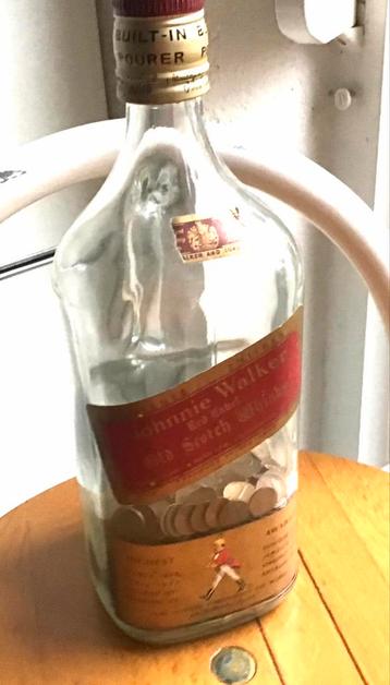 Johnny walker en nederlandse koperen centen beschikbaar voor biedingen