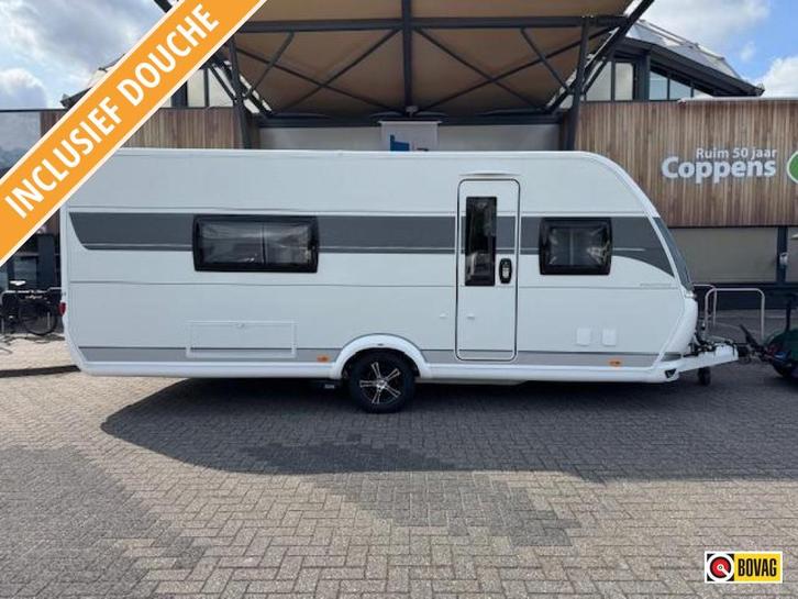 Hobby Prestige 560 WLU 2023 MOVER + LUIFEL!, Caravans en Kamperen, Caravans, tot en met 4, 1250 - 1500 kg, Rondzit, Hobby, 2 aparte bedden