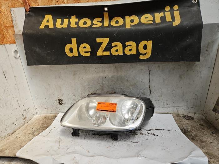 Koplamp links van een Volkswagen Touran, Auto-onderdelen, Verlichting, Volkswagen, Gebruikt, 3 maanden garantie, Ophalen of Verzenden