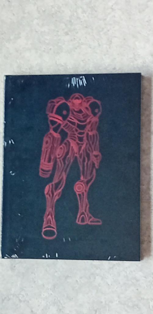 Metroid Prime 1–3 : Une rétrospective visuelle (en anglais), Livres, Cinéma, Tv & Médias, Neuf, Médias, Enlèvement