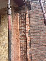 Ik doen het draag muuren afbeken en poutrel plaatsen.