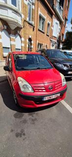 Nissan Pixo rouge de 2011, Auto's, Voorwielaandrijving, 4 zetels, Stof, 50 kW