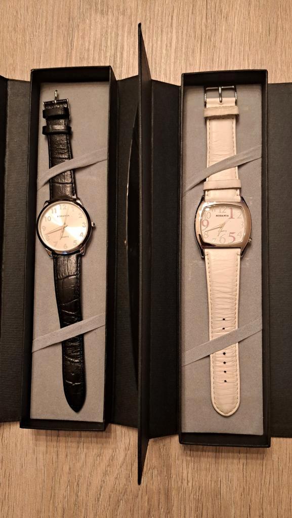 2 montres Rodania à quartz (noir et blanc), Bijoux, Sacs & Beauté, Montres | Femmes, Neuf, Montre-bracelet, Autres marques, Acier