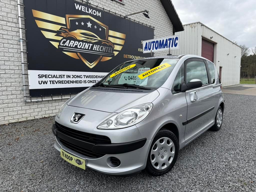 Peugeot 1007 1.4i benzine AUTOMAAT met 102 000 km GARANTIE !, Auto's, Peugeot, Automaat, 4 zetels, Zilver of Grijs, Stadsauto