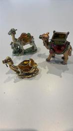 3 kamelen beeldjes, Ophalen