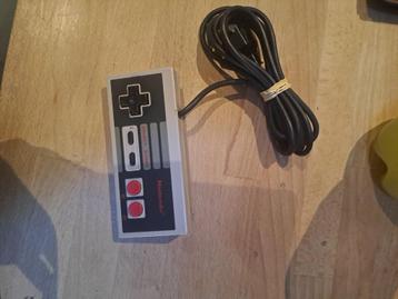 nes controller disponible aux enchères