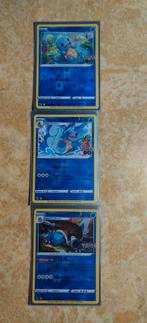 Squirtle, Wartortle en Blastoise Reverse H PGo - Conditie NM, Ophalen, Nieuw, Meerdere kaarten