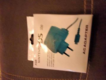 nintendo ds lite lader en spelletjes beschikbaar voor biedingen