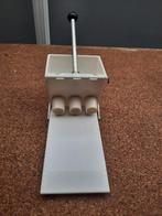 Krokettenmachine, Ophalen