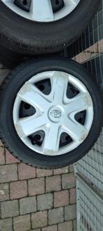 4 jantes Toyota Aygo + pneus neige 155/65R14 75T, Auto-onderdelen, Banden en Velgen, Ophalen, 14 inch, Gebruikt, 155 mm