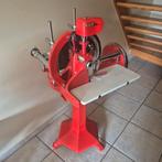 Vleessnijmachine met handwiel, Enlèvement