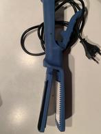 Haar stijltang, Enlèvement