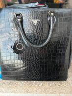 Handtas prada, Ophalen