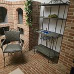 Stoel uit smeedijzer en bijhorend rek, Ophalen