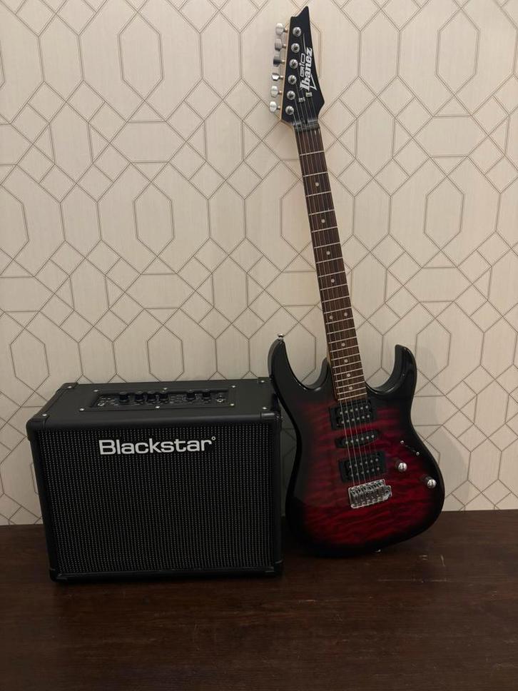 Elektrische gitaar en versterker, Muziek en Instrumenten, Snaarinstrumenten | Gitaren | Elektrisch, Zo goed als nieuw, Solid body