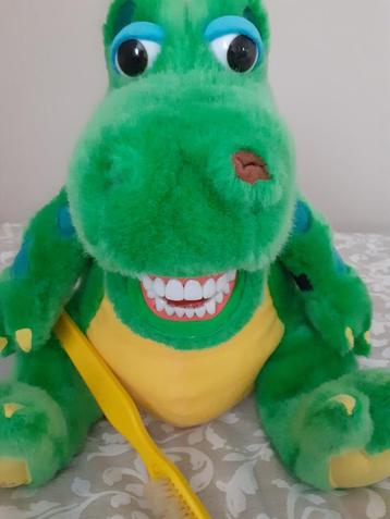Un alligator pour apprendre aux enfants à se brosser les den