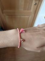 Armband met bedeltjes, Ophalen of Verzenden, Zo goed als nieuw, Roze, Kunststof of Plastic