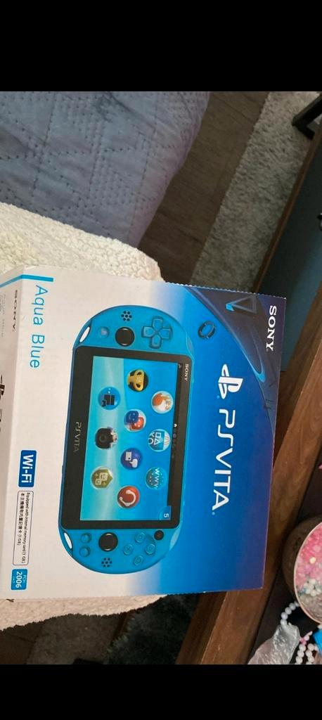 Sony PS Vita Aqua Blue in Perfecte Staat!, Games en Spelcomputers, Spelcomputers | Sony PlayStation Vita, Zo goed als nieuw, Ophalen of Verzenden