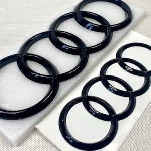 Audi zwarte emblemen ringen/logo's voor grill en koffer, Ophalen of Verzenden