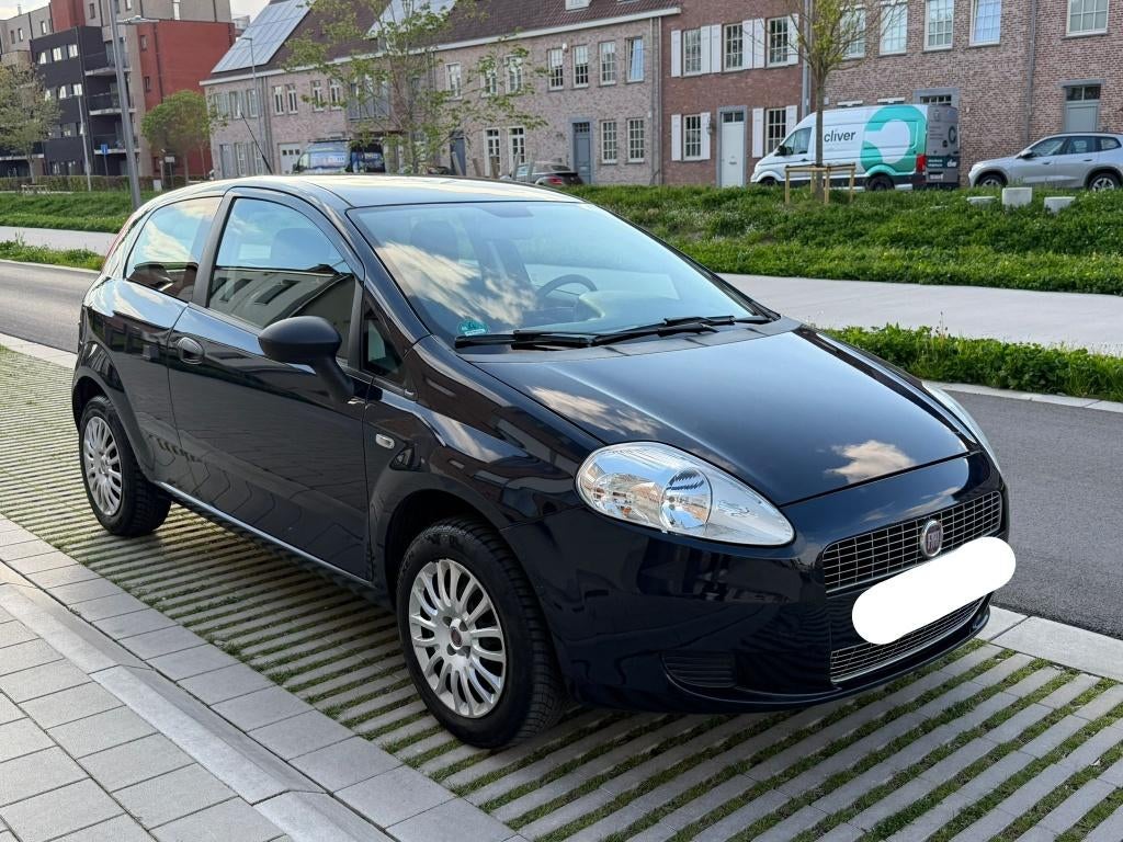 Fiat Punto 2009 met 67071km, 1242 cc, Blauw, Handgeschakeld, Particulier