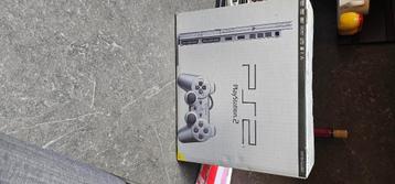 PS2 slim grijs in doos beschikbaar voor biedingen