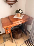 Antieke naaimachine, Ophalen