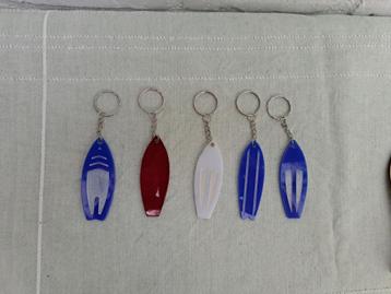 sleutelhangers "surfboard" beschikbaar voor biedingen