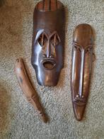 Masques africains en bois, Ophalen