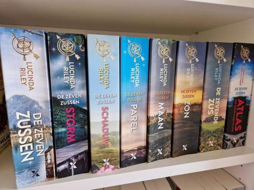 Zeven zussen - Lucinda Riley - Xander Uitgevers B.V - 8x -, Boeken, Fantasy, Gelezen, Ophalen of Verzenden