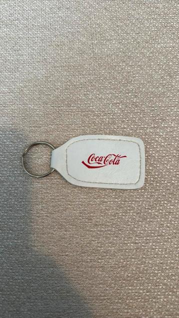 Vintage sleutelhanger van Coca-Cola beschikbaar voor biedingen