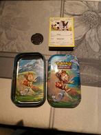 Pokemon tin met 50 kaarten en muntje, Ophalen of Verzenden, Zo goed als nieuw