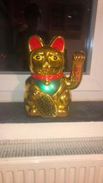 Chinese geluk kat (goud), Ophalen