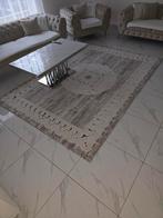 Groot en klein vloerkleed, Ophalen