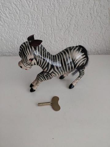 Vintage blikken zebra beschikbaar voor biedingen
