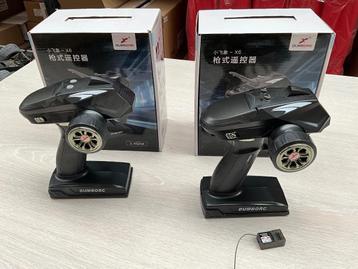 Lot 2x Dumbo RC zender beschikbaar voor biedingen