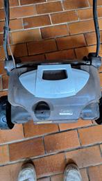 Verticuteer machine, Ophalen