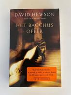 Het Bacchus offer, David Hewson, in perfecte staat, Boeken, Ophalen of Verzenden, Gelezen