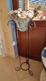 Staander met krans, Ophalen