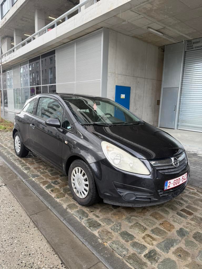 opel corsa 1.2 benzine, Auto's, Opel, Voorwielaandrijving, Stof, Zwart, 1198 cc