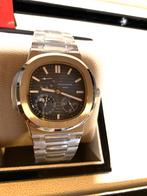 Montre Patek Philippe Nautilus, Enlèvement, Neuf