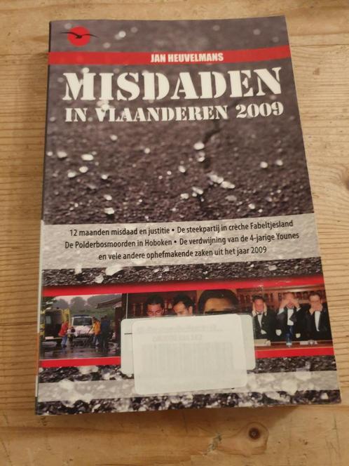 Jan Heuvelmans - Misdaden in Vlaanderen 2009. Ex bib boek, Boeken, Politiek en Maatschappij, Zo goed als nieuw, Ophalen of Verzenden
