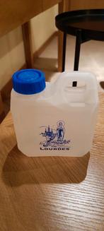 Bidon met water uit Lourdes, Ophalen